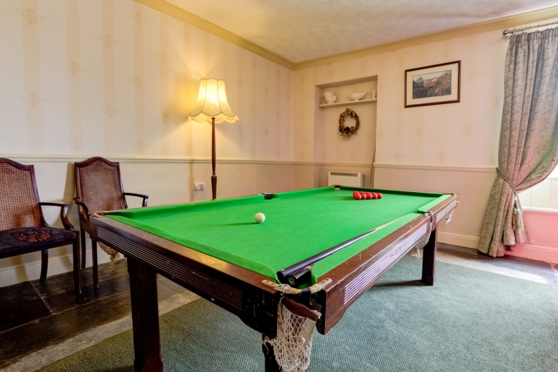 snooker table in dinning room