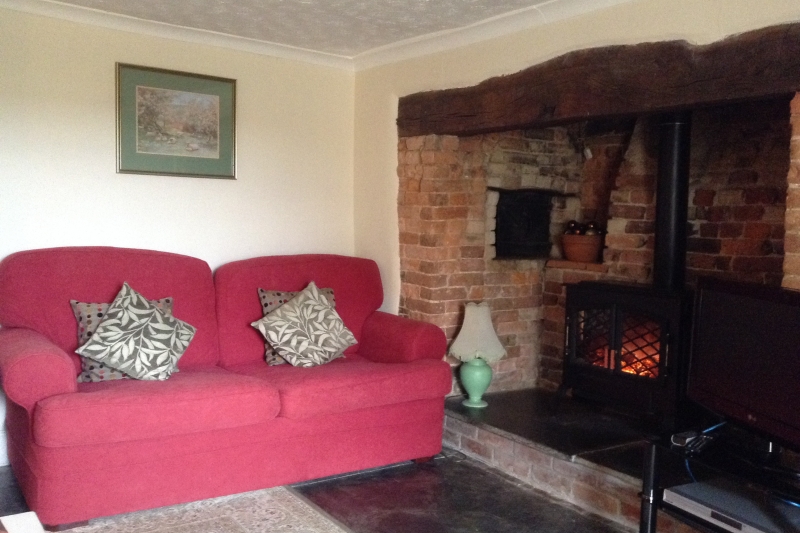 Lounge with inglenook fireplace