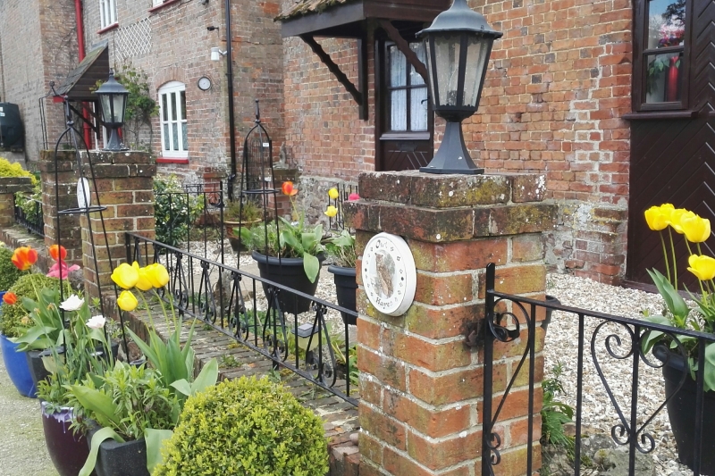 Tubs in front of cottages