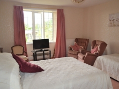 family room with en suite bathroom fridge, Tv , Guests can return at any time if they wish