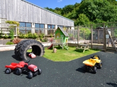 Toddler 'race track' and walk-in rabbit area