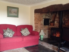 Lounge with inglenook fireplace