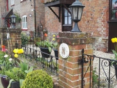 Tubs in front of cottages