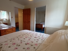 Double bedroom showing adjoining twin room