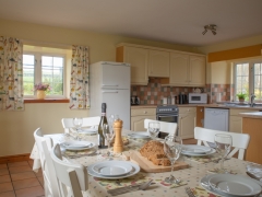 Well equipped kitchen and dining area