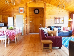 Open plan living area and well equipped kitchen