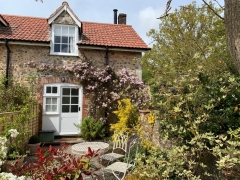 Garden Cottage exterior and patio